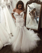 Vestidos de novia de sirena con hombros descubiertos