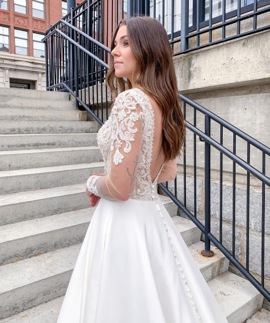 Vestido de novia romántico de encaje suave, manga larga, corte A y escote en V 