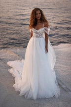 Vestidos de novia románticos de encaje, con tirantes finos y mangas cortas