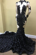Abito da sera lungo nero con maniche lunghe, pizzo e fondo decorato con fiori