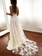 Vestido de novia sexy largo de corte A con tirantes finos, de encaje, sin espalda y con abertura