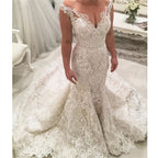 Robe de mariée longue sirène sexy à décolleté en V avec fines bretelles et appliques en dentelle
