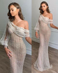 Abito da sera lungo sirena con paillettes, monospalla e maniche gonfie