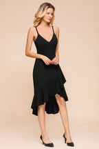 Robe de soirée noire vintage dos nu, fines bretelles spaghetti, décolleté en cœur, coupe ajustée, ourlet asymétrique