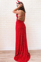 Abito lungo da sera rosso lucido a sirena con scollo a V, senza schienale e con paillettes