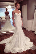 Robe de mariée sirène en dentelle, dos nu, bretelles, corsage ajusté, jupe boule