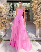 Abito da sera rosa chiaro a linea ad A senza spalline in organza