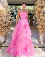 Abito da sera rosa chiaro a linea ad A senza spalline in organza