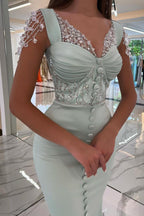Robe de bal longue sirène en satin à paillettes avec décolleté en cœur et fente spectaculaire