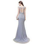 Robe de soirée sirène argentée moulante à perles, sans manches, col en V profond et élégante