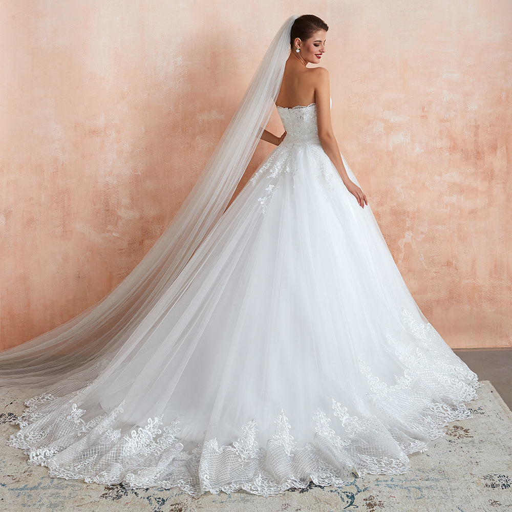 Elegante vestido de novia largo de tul con apliques y corte en A sin tirantes