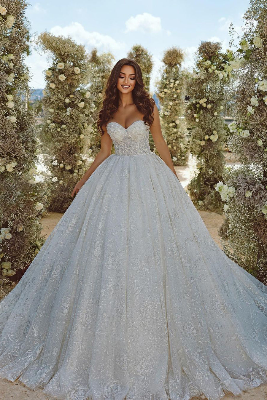 Vestido de novia de encaje con escote en forma de A y mangas