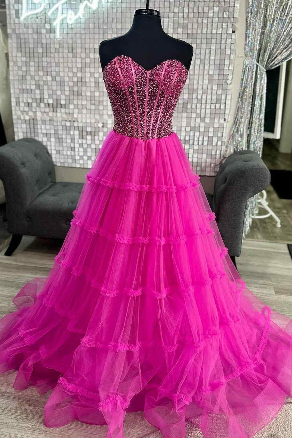 Eddye | Vestido de fiesta de tul con volantes y cuentas en fucsia cariño