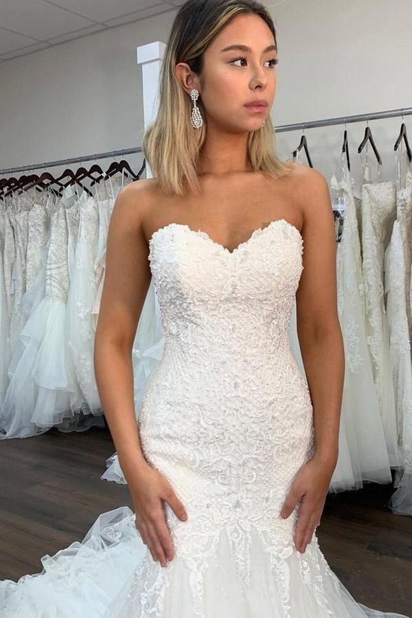 Abito da sposa sirena in pizzo sexy con scollo a cuore e balze