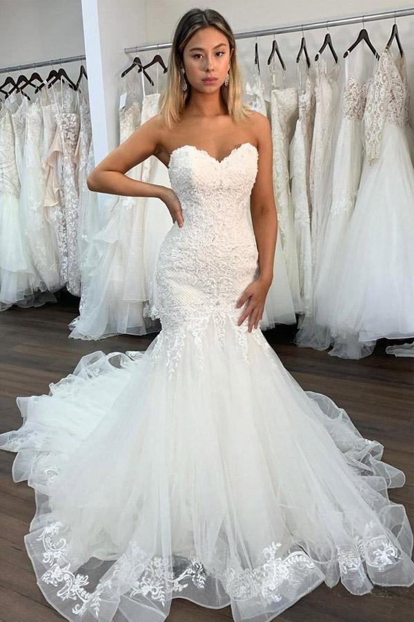 Abito da sposa sirena in pizzo sexy con scollo a cuore e balze