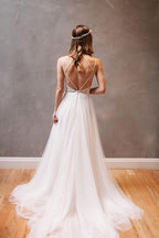 Vestido de novia de gasa blanca con tirantes de corazón y cuentas
