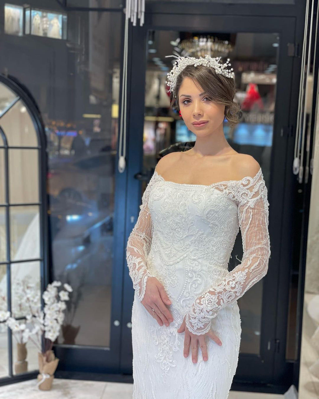 Robe de mariée sirène en dentelle à manches longues et longueur au sol, tendance