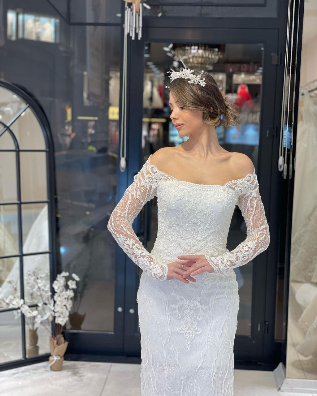 Robe de mariée sirène en dentelle à manches longues et longueur au sol, tendance