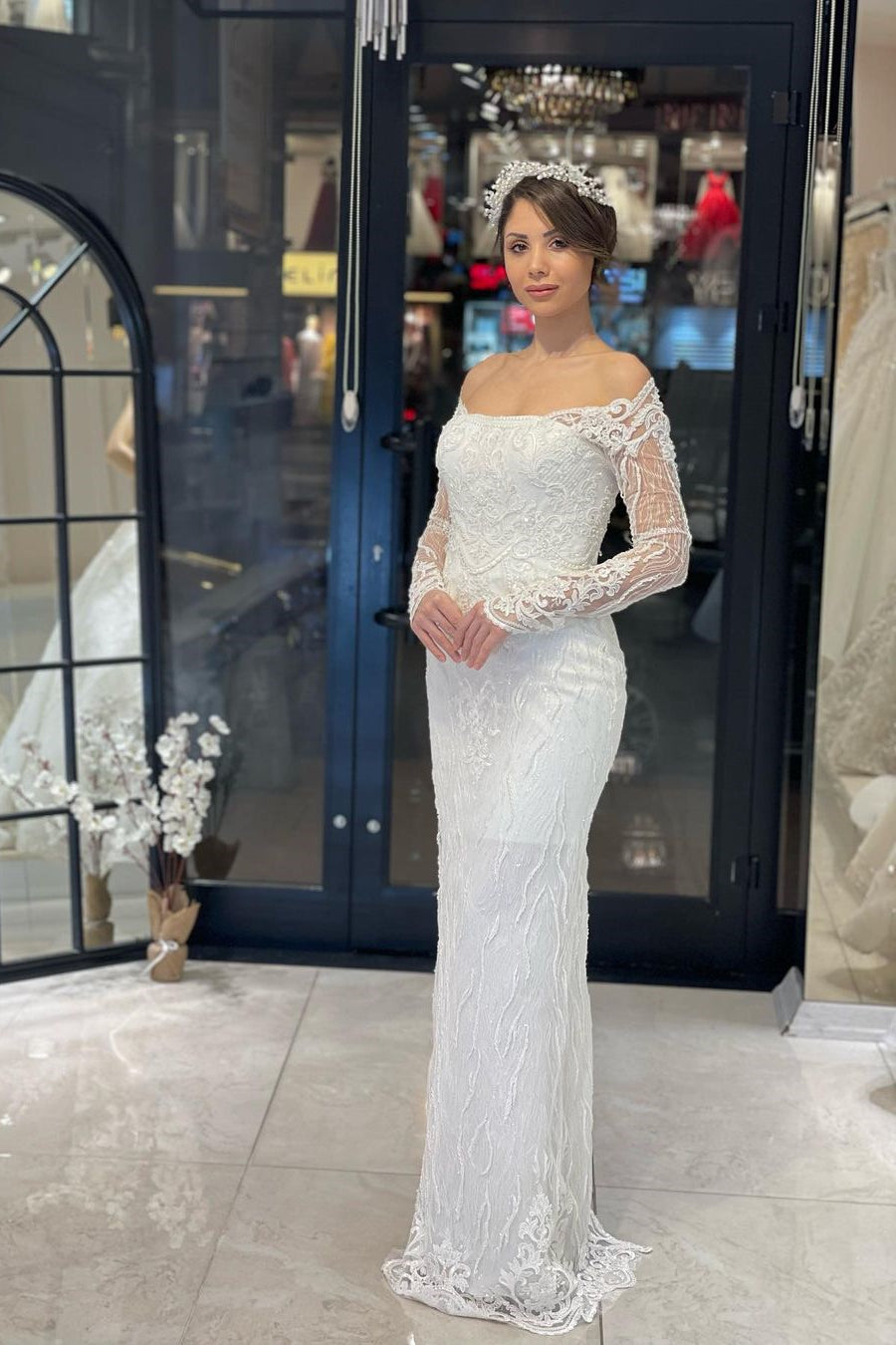 Robe de mariée sirène en dentelle à manches longues et longueur au sol, tendance
