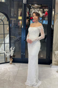 Robe de mariée sirène en dentelle à manches longues et longueur au sol, tendance