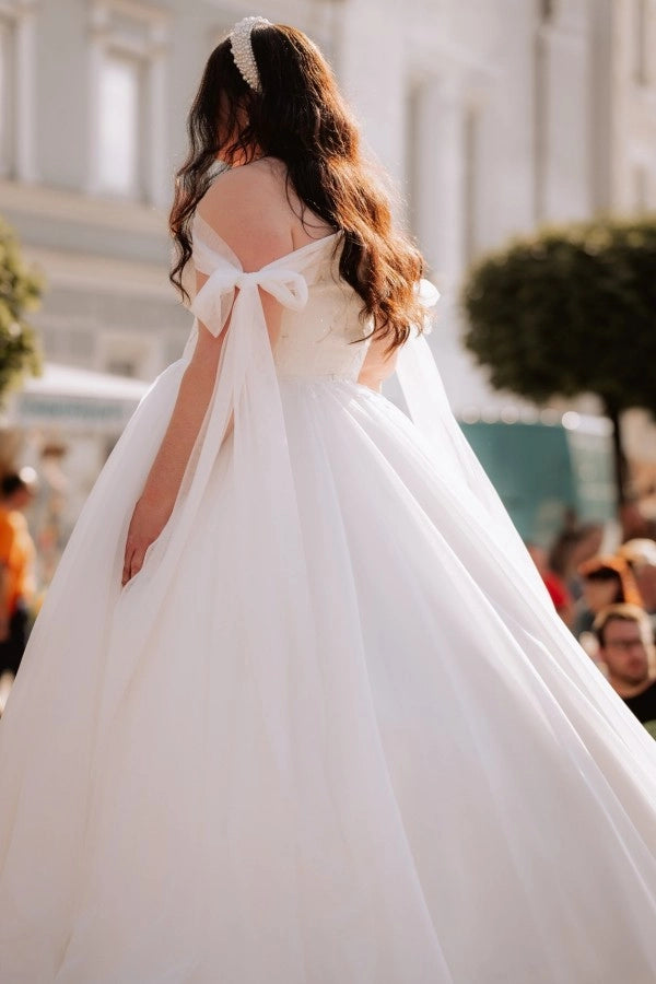 Trendy White Off-The-Shoulder Sleeveless Ball Gown Wedding Dress with Appliques