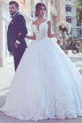 Robe de mariée à jupe bouffante avec encolure en V en tulle et appliques de dentelle