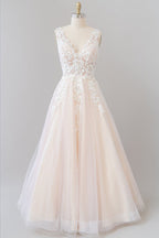 Robe de mariée longue jusqu'au sol en tulle avec appliques et col en V