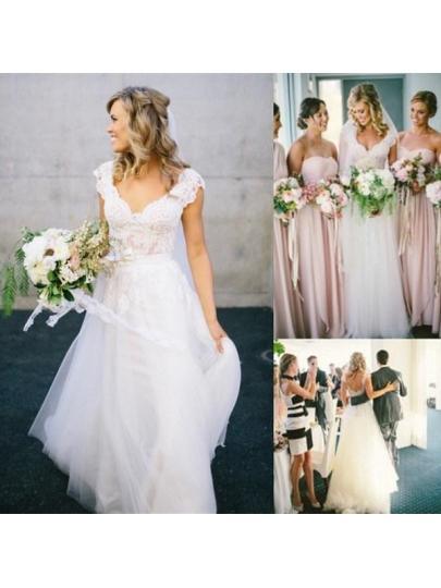 Vestido de novia de corte A con escote en V, encaje, tul y mangas casquillo