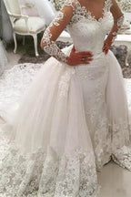 Vestido de novia con escote en V, mangas largas, apliques y cola Watteau