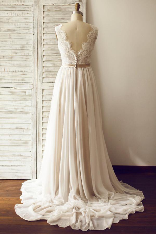 Vestido de novia sin mangas con escote en V y espalda abierta con faja de encaje