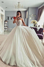 Abito da sposa vintage in tulle con maniche lunghe in pizzo a linea ad A