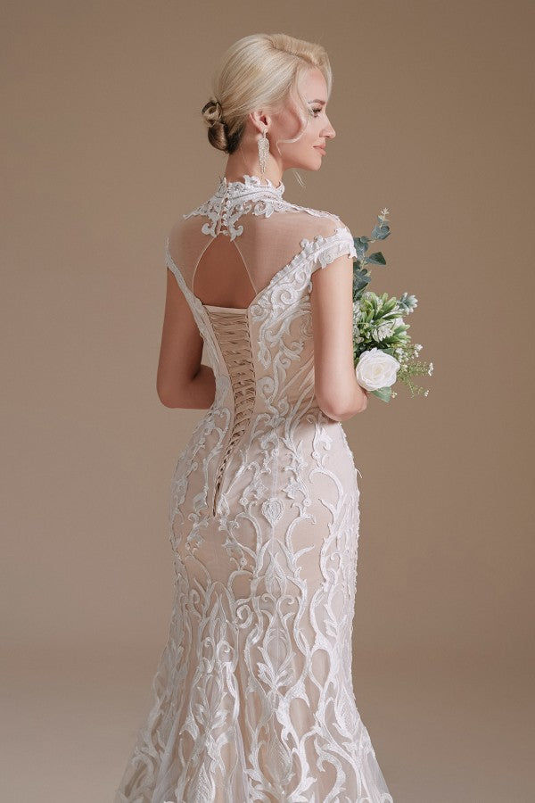 Vestido de novia vintage de sirena largo con cuello alto y encaje con mangas
