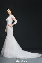 Vestido de novia de sirena con encaje blanco y joya